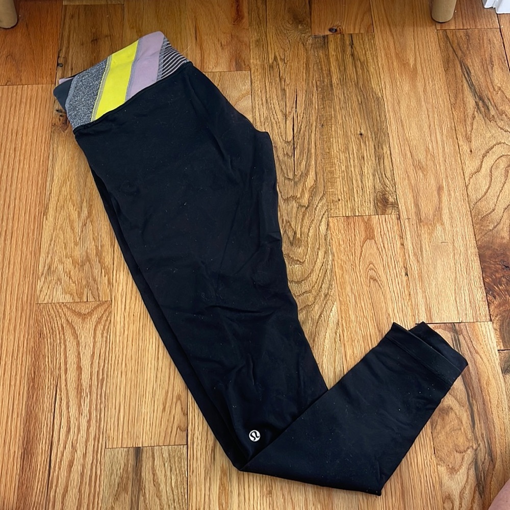 Lululemon Athletica full length black legging - reversible w/ purple gold band